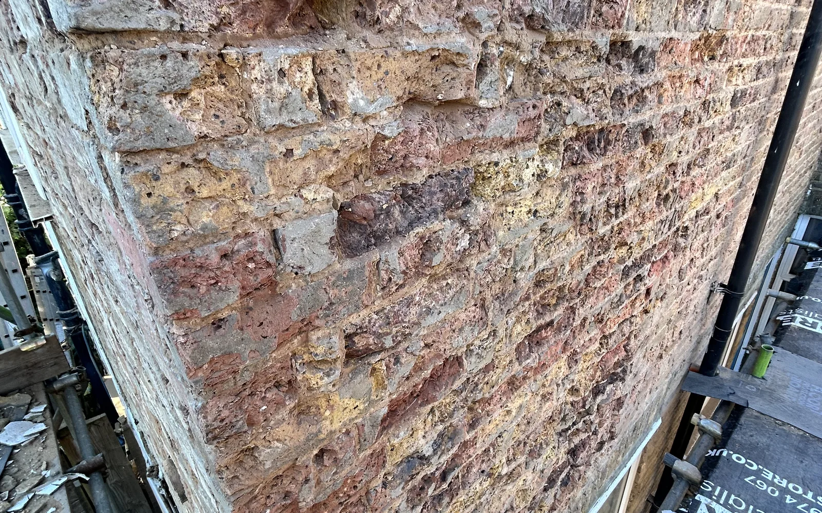 Exposed building fabric photographed during a damp and moisture investigation